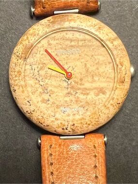 Tissot Beige Round Rock Watch with Red and Yellow Hands